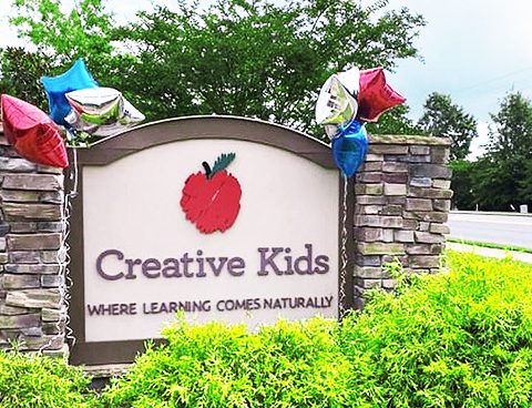Creative-Kids-Family-Lake-Wylie-sign-with-balloons